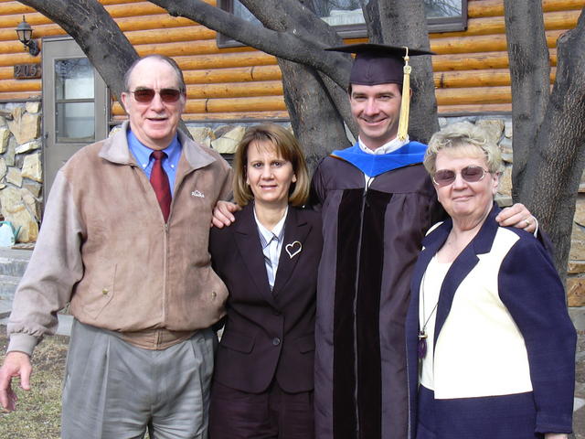 With Dad, Laura, and Mom.